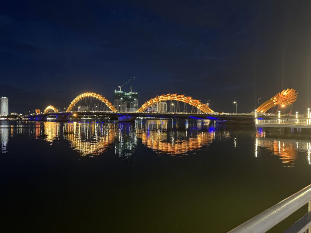 Night view of the Dragon Bridge's tail side in Da Nang, Vietnam