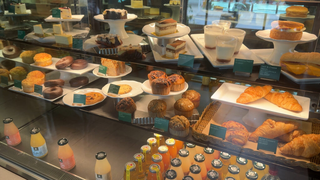 Pastry and dessert showcase inside Starbucks Hoi An
